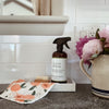 Lavender Vanilla All Purpose Cleaner bottle on kitchen counter, safe natural cleaner for everyday use.