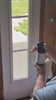 Mom spraying Lavender Vanilla Cleaner  Spray on window, safe and effective natural all-purpose cleaner for glass, mirrors, granite, bathrooms and kitchens.