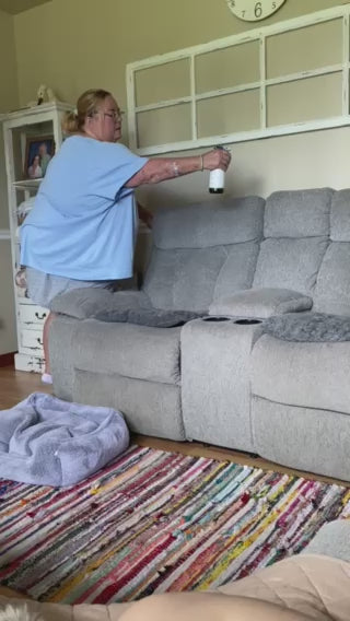 Video of woman spraying couch with Peppermint Vanilla all natural cleaner, aromatherapy fabric and air refresher.